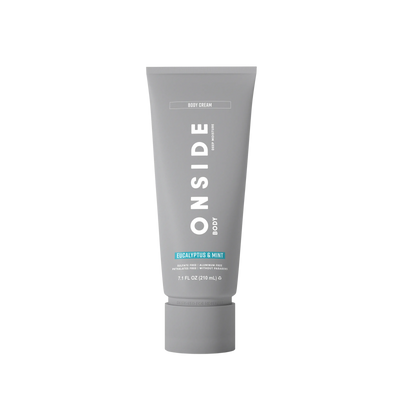 Gray tube of 'ONSIDE' body cream on a white background